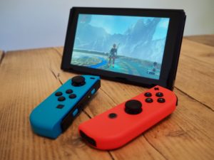 Nintendo Switch with detached Joy-Con controllers