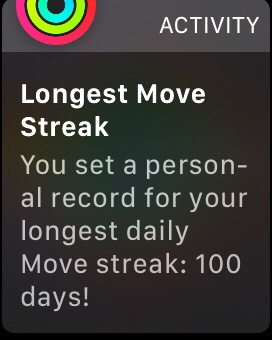 A notification on the Apple Watch, congratulating the user on reaching a 100 day Move streak.